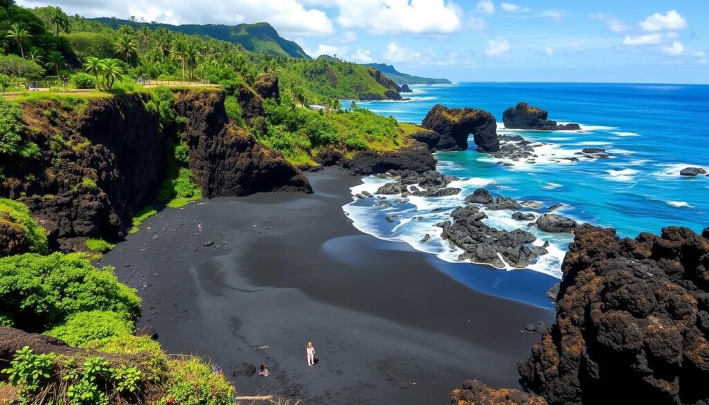 Black sand beach at Waianapanapa State Park near Hana, Maui - one of Hawaii's hidden beach towns USA Black sand beach at Waianapanapa State Park near Hana, Maui - one of Hawaii's hidden beach towns USA